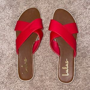 Red leather sandal.